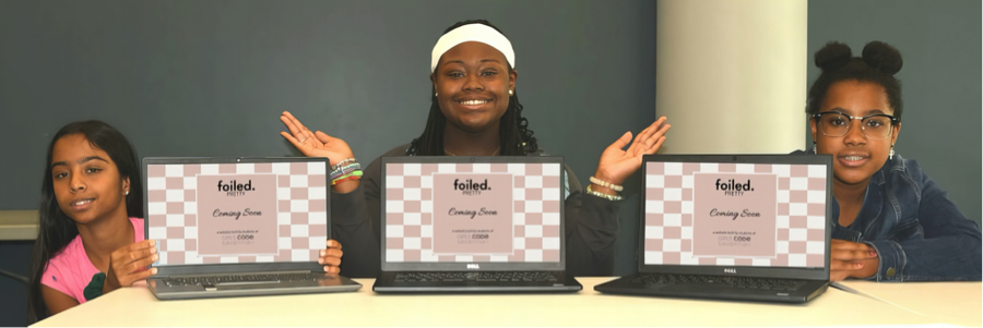 Three Girls Code Savannah students behind laptops showing the Foiled Pretty website Coming Soon page
